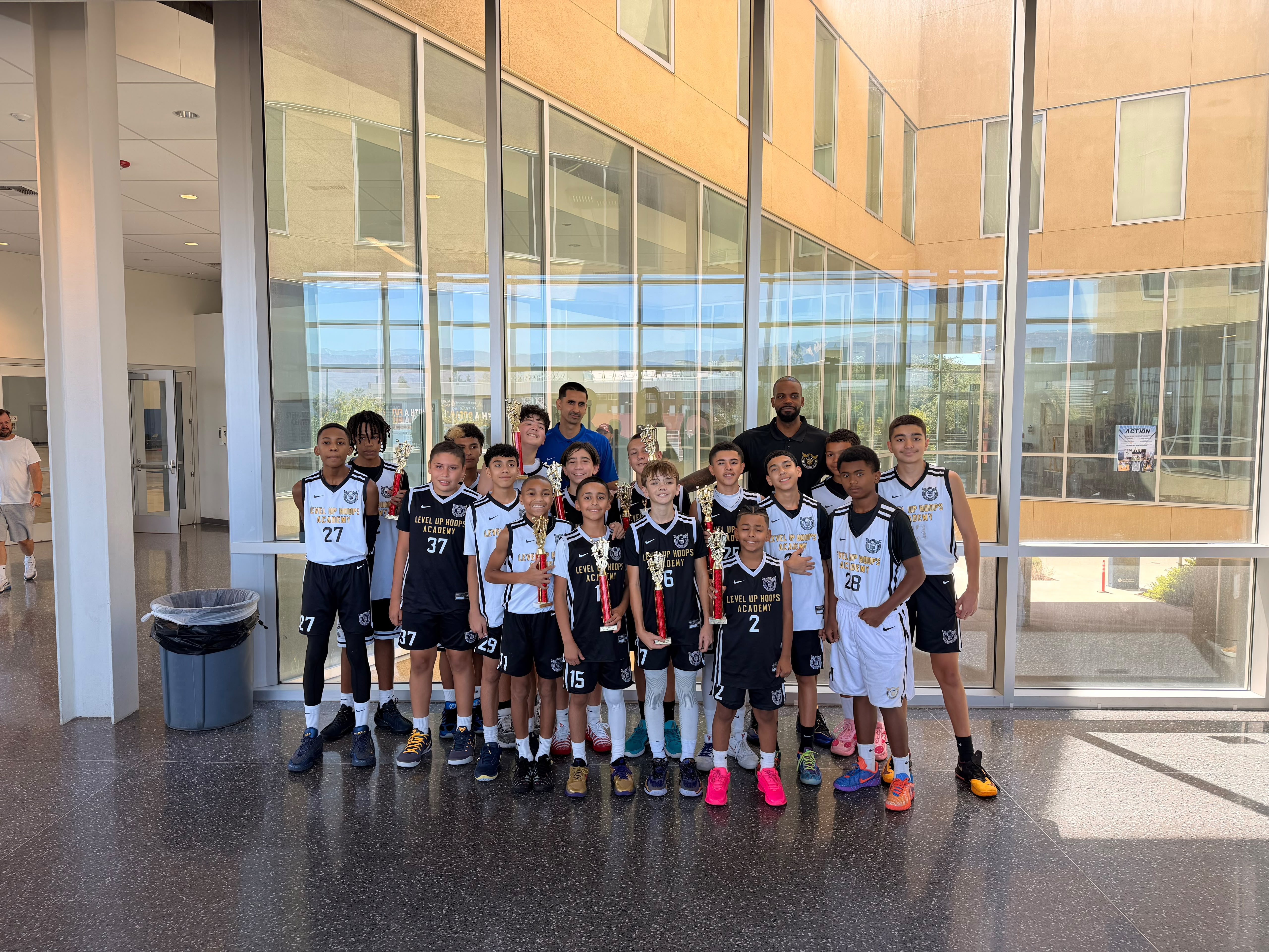 Boys 13U Gold and Silver team with coaches